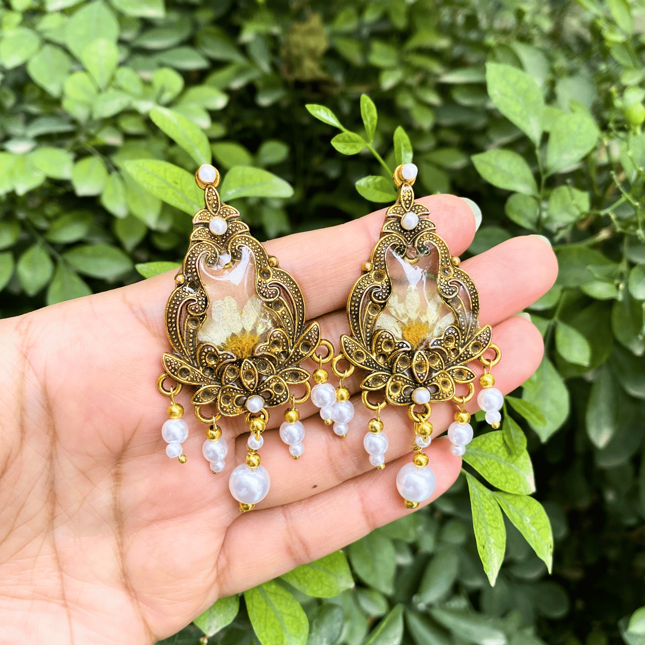 Golden bloom dangling earrings