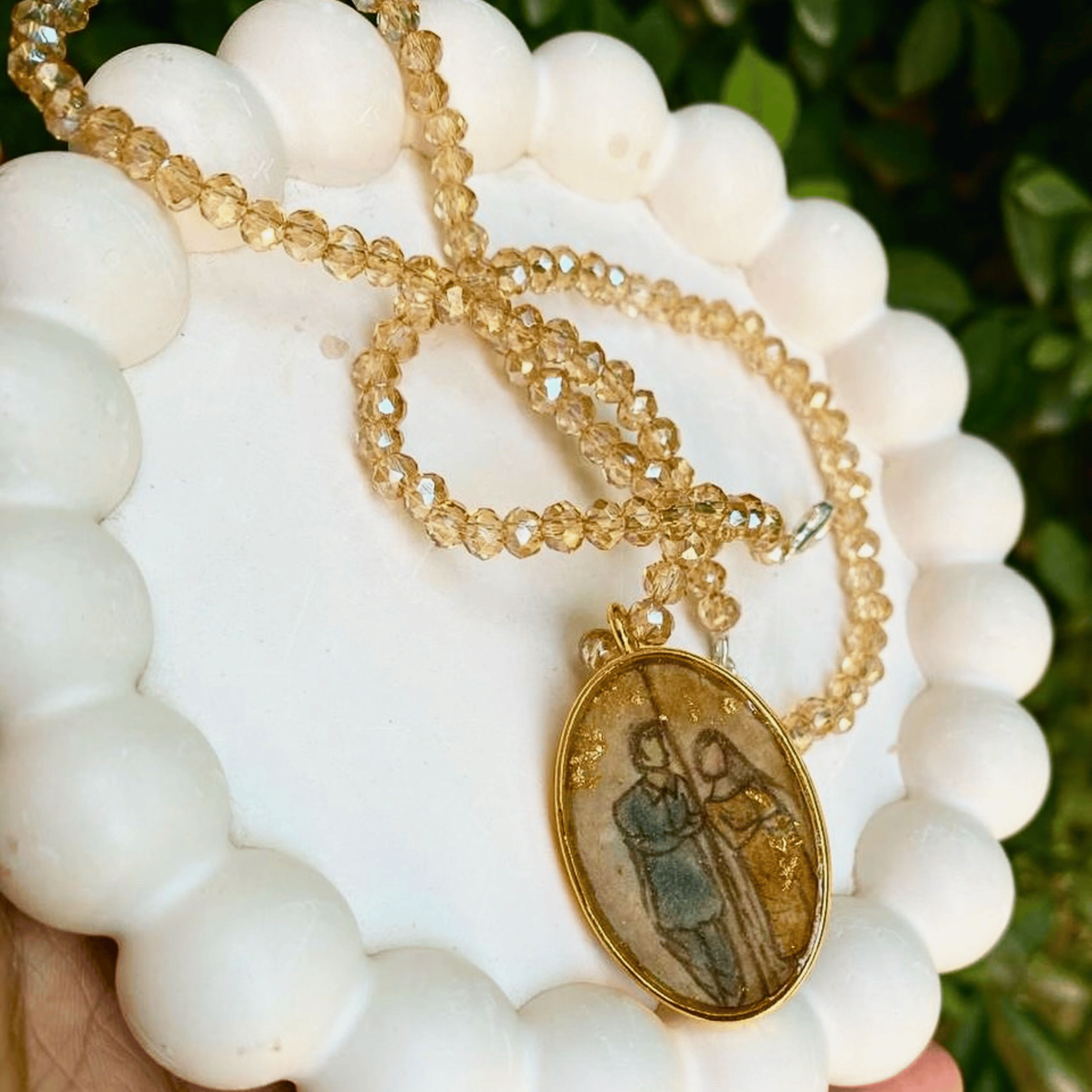 Double sided sketch and calligraphy pendent